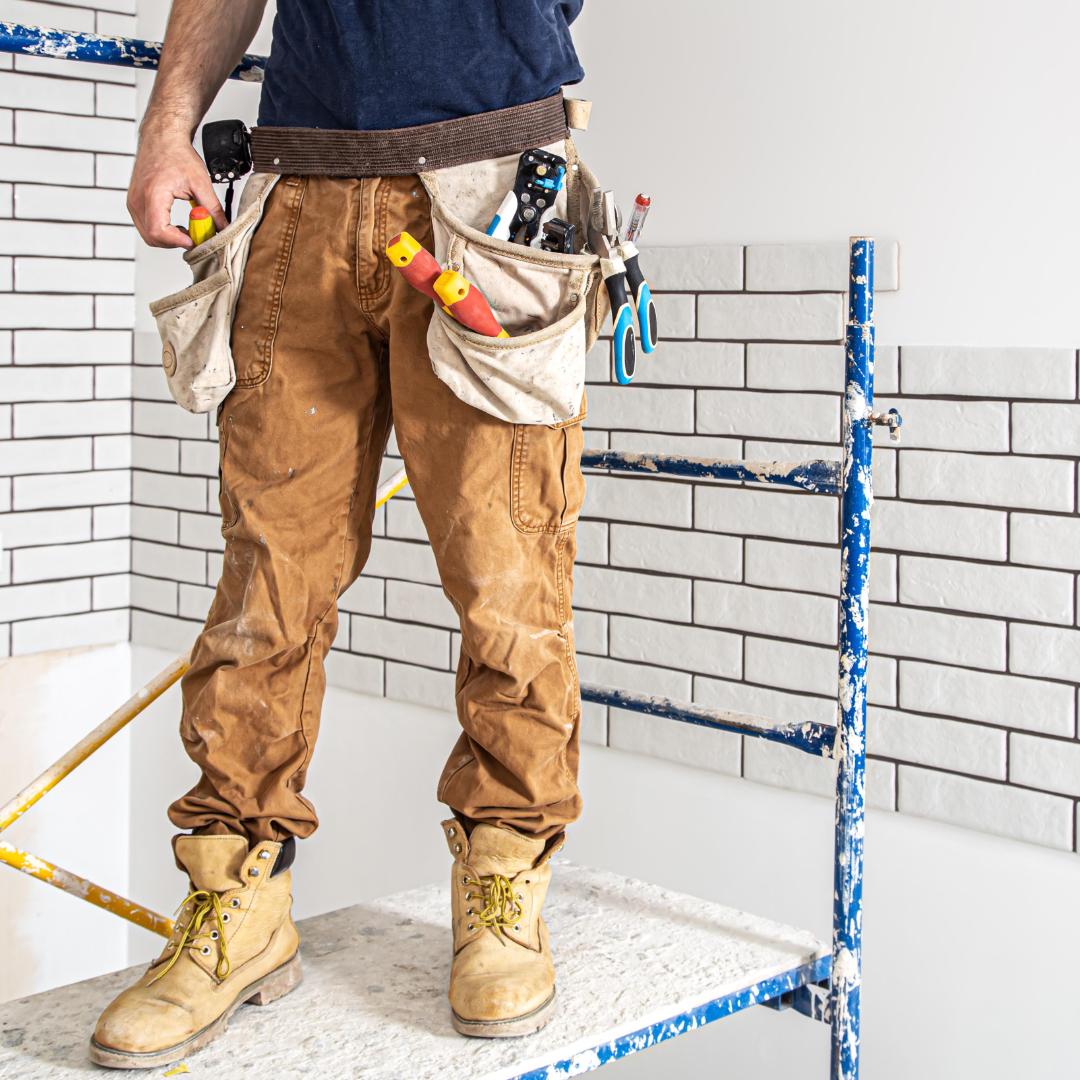 Professional tiling work in progress—highlighting labor quality and installation standards in bathroom renovation.
